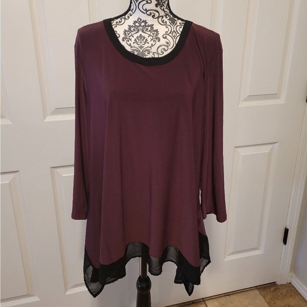 Woman's purple and‎ black tunic top